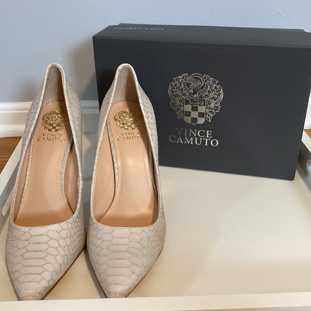 From Vince Camuto, the Savilla Snake Embossed Design Dress Pumps